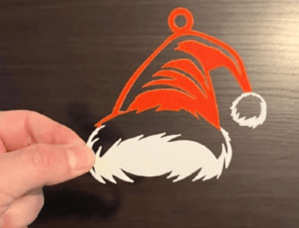 Adorno para árbol con forma de gorro